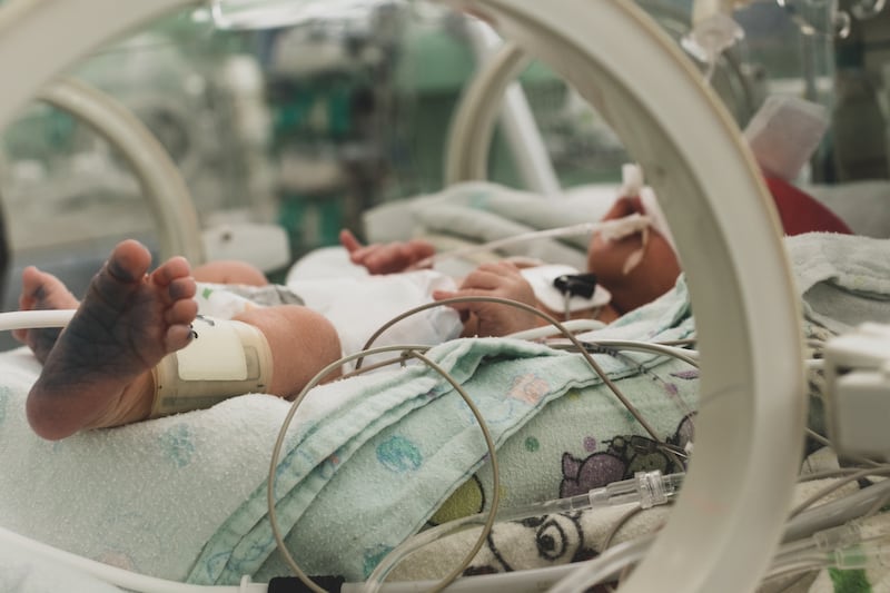 An infant in an intensive care unit.