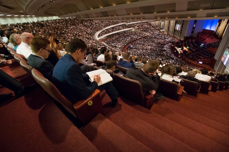 Conferencegoers listen during the Church of Jesus Christ’s general conference in Salt Lake City on April 1, 2018.