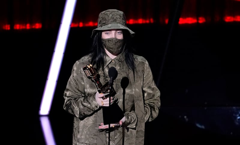 Billie Eilish accepts the award for top Billboard 200 album.