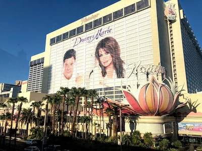 The faces of Donny Osmond and his sister Marie Osmond adorn the side of the Flamingo Hotel in Las Vegas, site of their long-running show.