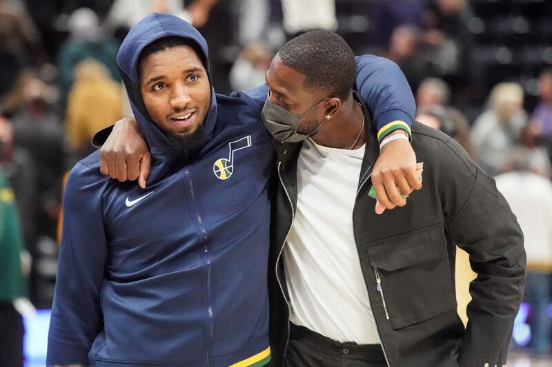 Utah Jazz guard Donovan Mitchell and Utah Jazz minority owner Dwayne Wade talk