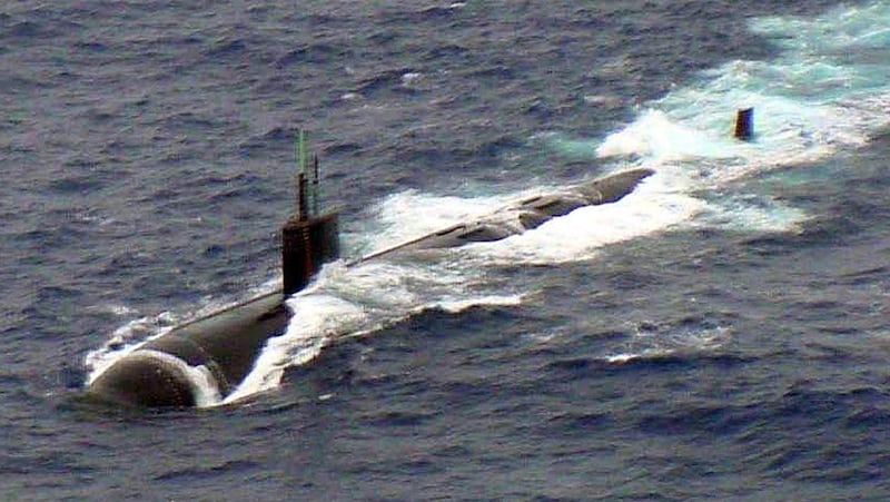 FILE -- In a Feb. 9, 2001 file photo the USS Greeneville, a Los Angeles-class submarine, is shown underway after colliding with the Japanese fishing boat, Ehime. The Japanese families are expected to observe a moment of silence at 1:43 p.m. Wednesday, Fe