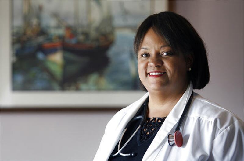 In this photo provided by the John D. and Catherine T. MacArthur Foundation, Dr. Regina Benjamin poses for a portrait in the waiting room at her temporary clinic in Bayou La Batre, Ala.