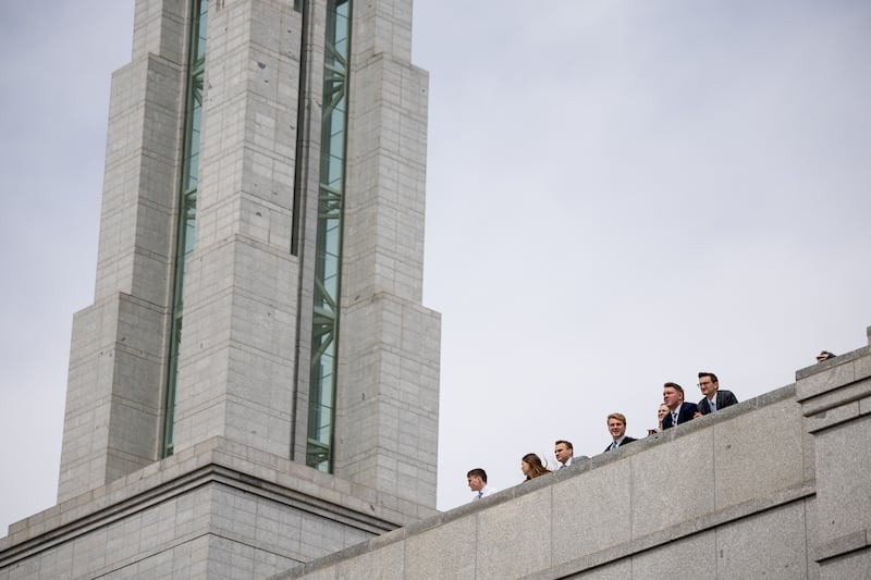 People stand on an upper floor of the Conference Center in Salt Lake City after a session of general conference of The Church of Jesus Christ of Latter-day Saints.