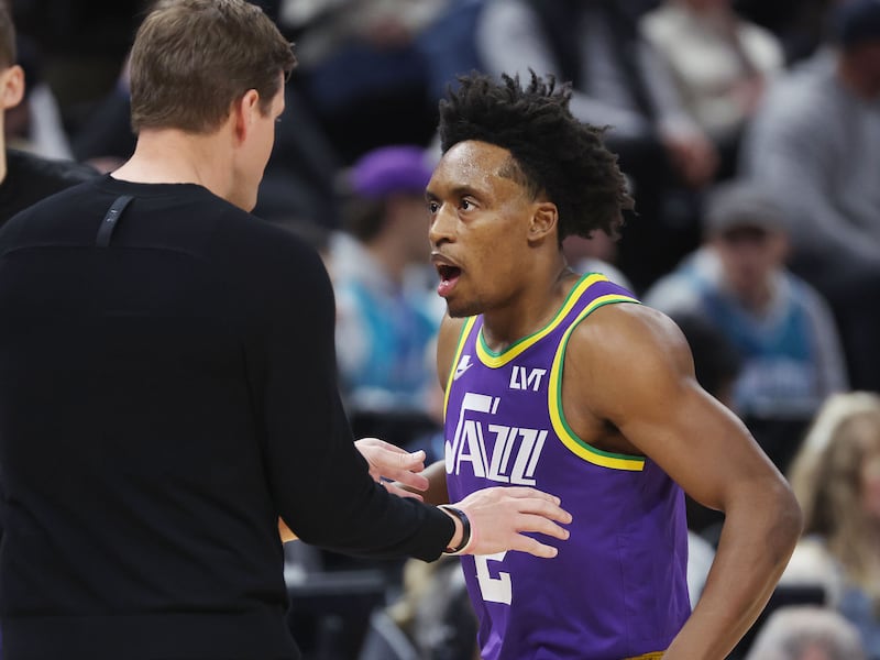 Utah Jazz coach Will Hardy talks with Utah Jazz guard Collin Sexton (2) in Salt Lake City on Thursday, Feb. 22, 2024.