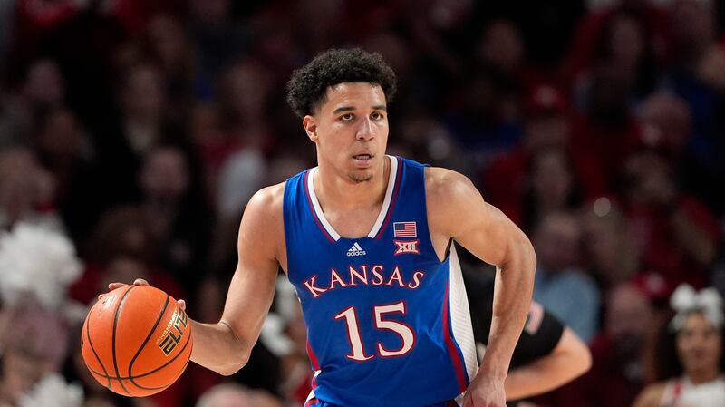 Kansas's Kevin McCullar Jr. brings the ball up the court against Houston on Saturday, March 9, 2024, in Houston. The Jazz could nab McCullar Jr. with the 29th pick.