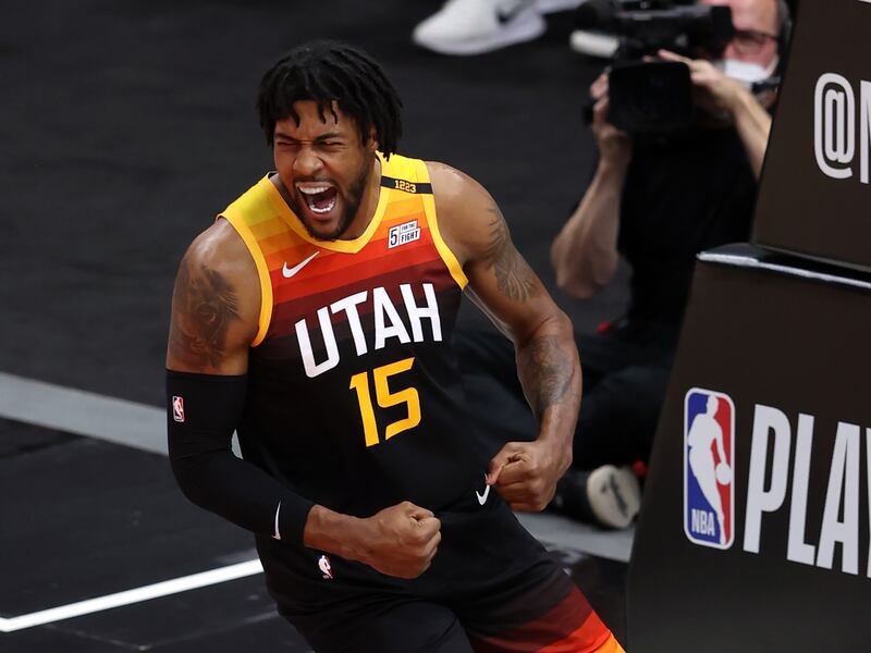 Utah Jazz center Derrick Favors celebrates a dunk as the Utah Jazz and Memphis Grizzlies play in Salt Lake City.