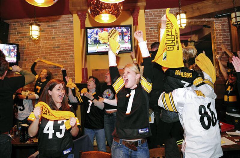 Pittsburgh Steeler fans celebrate their team's Super Bowl XLIII victory Sunday in Pittsburgh.