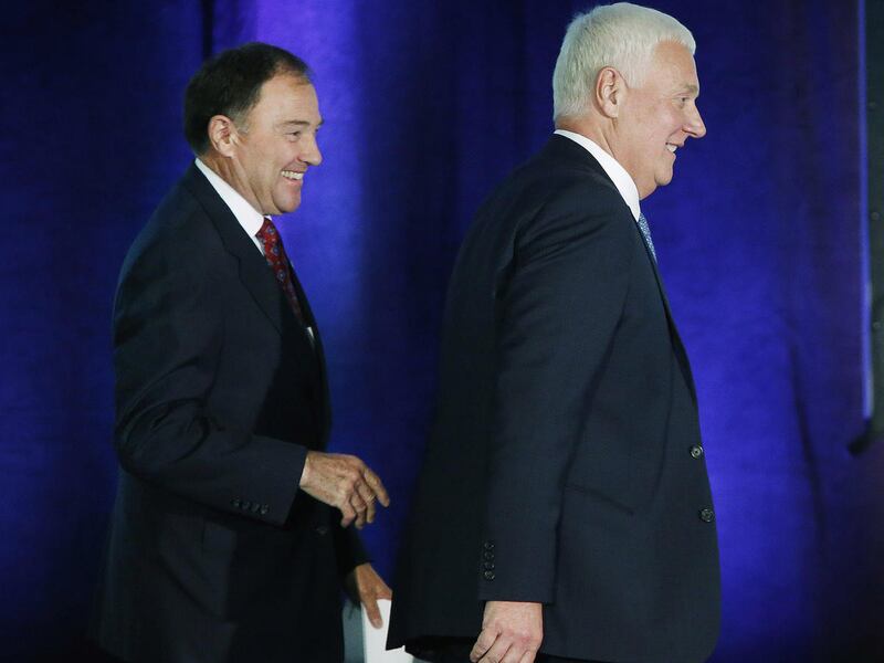 FILE - Candidates Utah Governor Gary Herbert and Mike Weinholtz prepare to debate in Salt Lake City on Friday, Sept. 16, 2016. The gubernatorial debate was hosted by the Utah League of Cities and Towns.