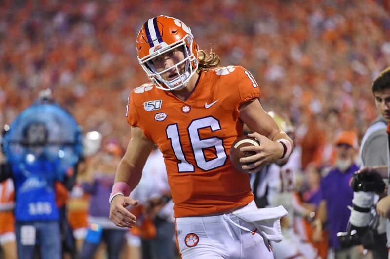 Clemson quarterback Trevor Lawrence runs through the endzone after rushing for a first down during the first half of an NCAA college football game against Boston College Saturday, Oct. 26, 2019, in Clemson, S.C. (AP Photo/Richard Shiro)