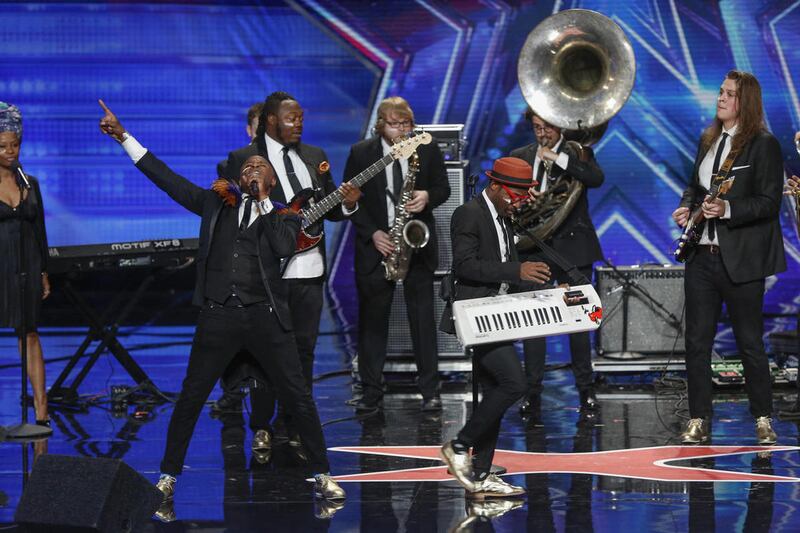 Alex Boyé and his band audition on "America's Got Talent."