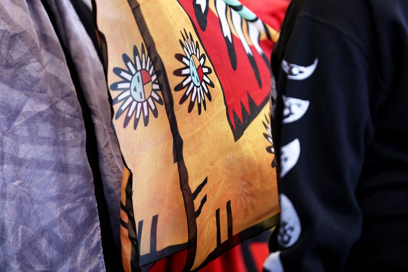 Participants practice their walking as they rehearse for an Indigenous fashion show at the Leonardo Museum in Salt Lake City on Sunday.