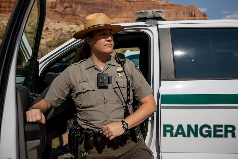 National Park Service ranger Melissa Hulls poses for a photo outside of the visitors center at Arches National Park.