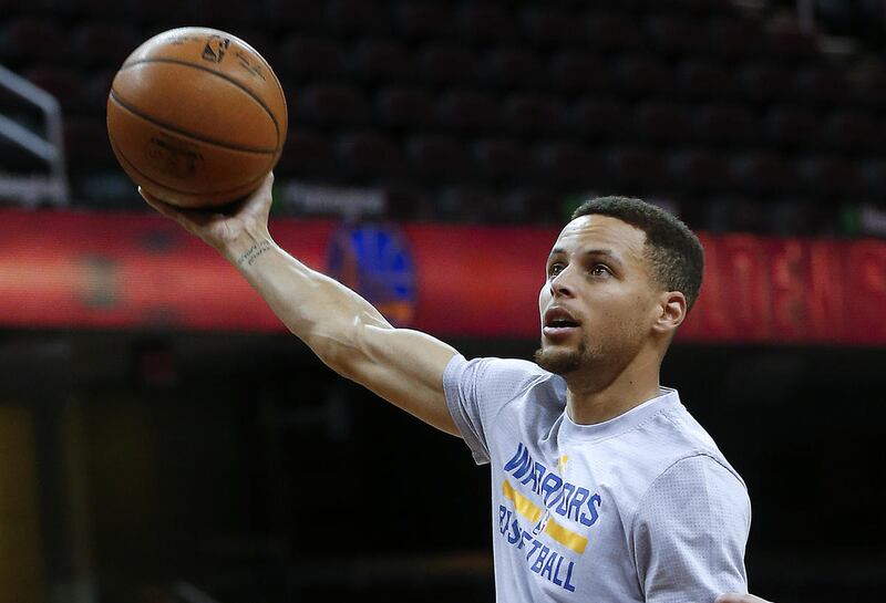 Golden State Warriors guard Stephen Curry shoots during practice for Game 4 of basketball's NBA Finals against the Cleveland Cavaliers in Cleveland, Thursday, June 9, 2016. (AP Photo/Paul Sancya)