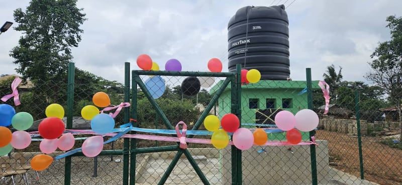 A fence surrounding the borehole was decorated by local Relief Society sisters for the celebration on July 22, 2025, in Addokrom, Ghana.