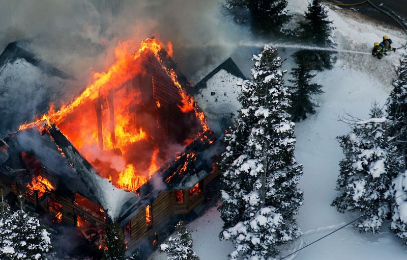 Park City Fire District firefighters respond to a house fire in the Summit Park area on Friday, Jan. 27, 2017.
