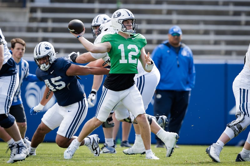 BYU starting QB Jake Retzlaff prepares to throw during spring camp at LaVell Edwards Stadium. Retzlaff is poised for a breakout year, but who else will step up?