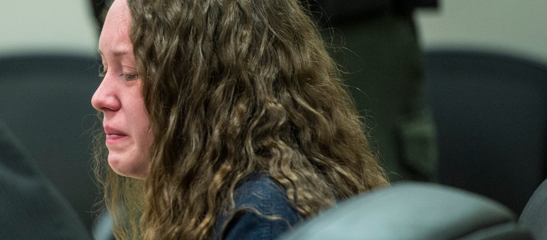 Meagan Grunwald cries in a courtroom.