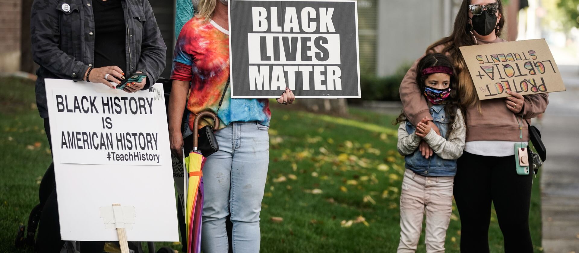 People rally in support of the LGBTQ community and teaching Black history in Salt Lake City on Thursday, Oct. 7, 2021.