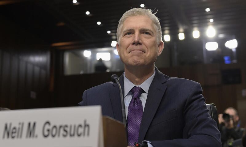 FILE - In this March 21, 2017, file photo Supreme Court Justice nominee Neil Gorsuch prepares to testify on Capitol Hill in Washington, at his confirmation hearing before the Senate Judiciary Committee. (AP Photo/Susan Walsh, File)