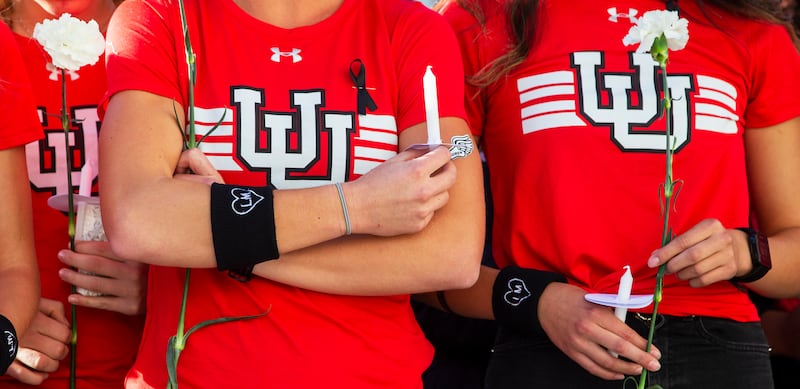 Members of the Utah track team attend a vigil for Lauren McCluskey on Oct. 24, 2018.