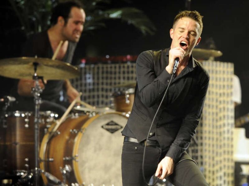 Brandon Flowers and drummer Ronnie Vannucci Jr. of The Killers perform in 2009. The two rockers discussed their LDS faith on “The Colbert Show.”