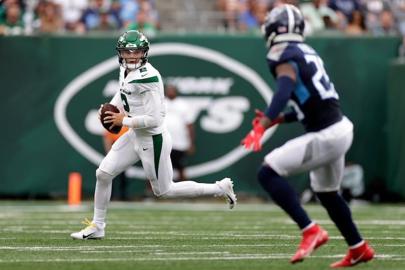 New York Jets quarterback Zach Wilson (2) passes against the Tennessee Titans.