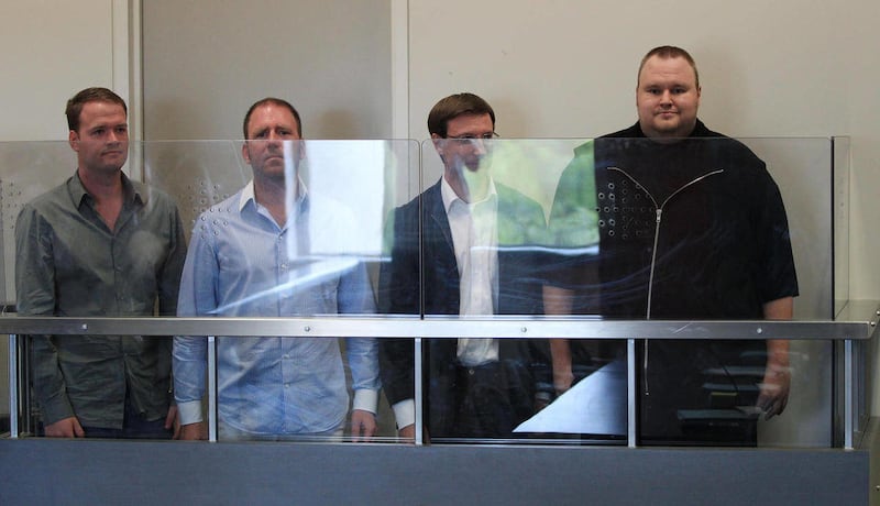 Megaupload.com employees Bram van der Kolk, also known as Bramos, left, Finn Batato,second from left, Mathias Ortmann and founder, former CEO and current chief innovation officer of Megaupload.com Kim Dotcom (also known as Kim Schmitz and Kim Tim Jim Ves