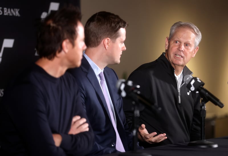 Utah Jazz owner Ryan Smith and new Jazz head coach Will Hardy listen to Utah Jazz CEO Danny Ainge speak at a press conference.