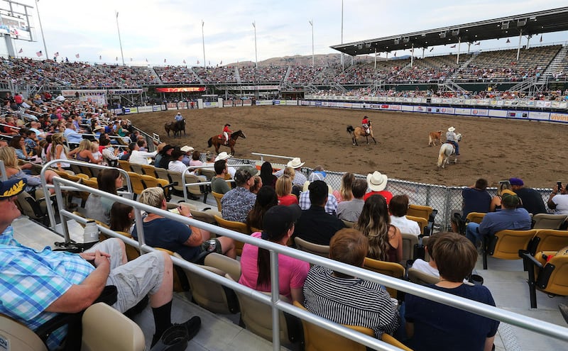 FILE: Cowboys compete during the annual Days of '47 rodeo at the new state fair park arena in Salt Lake City on Wednesday, July 19, 2017.