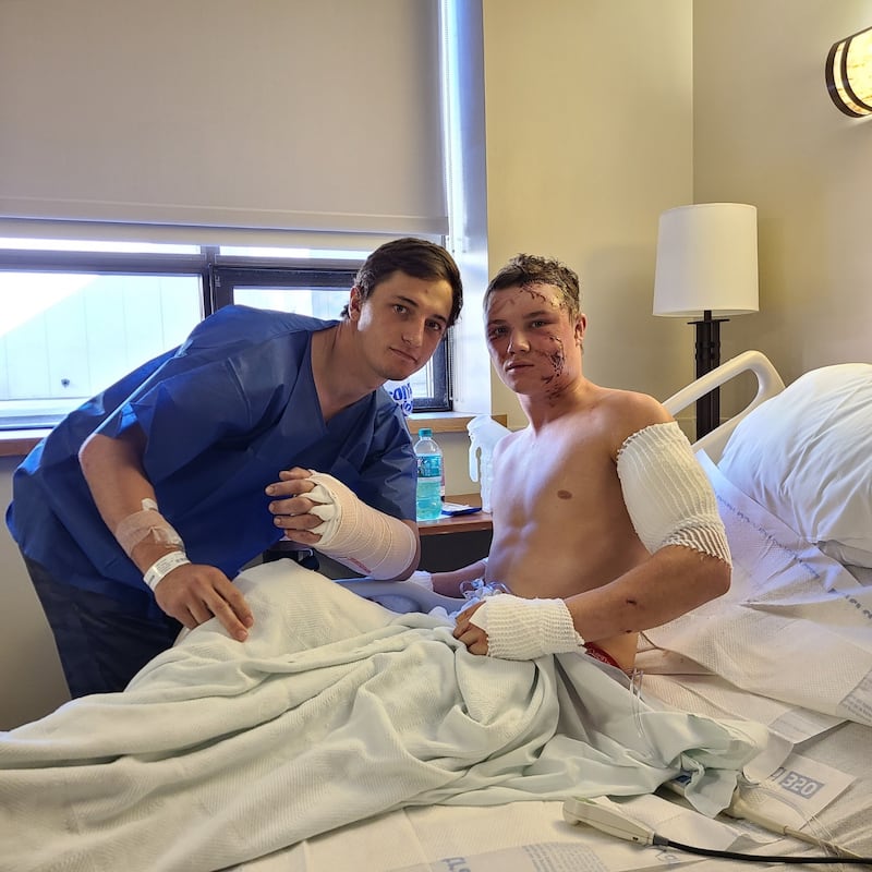 College students Brady Lowry, left, and Kendell Cummings, right, were injured in a bear attack in Cody, Wyoming.