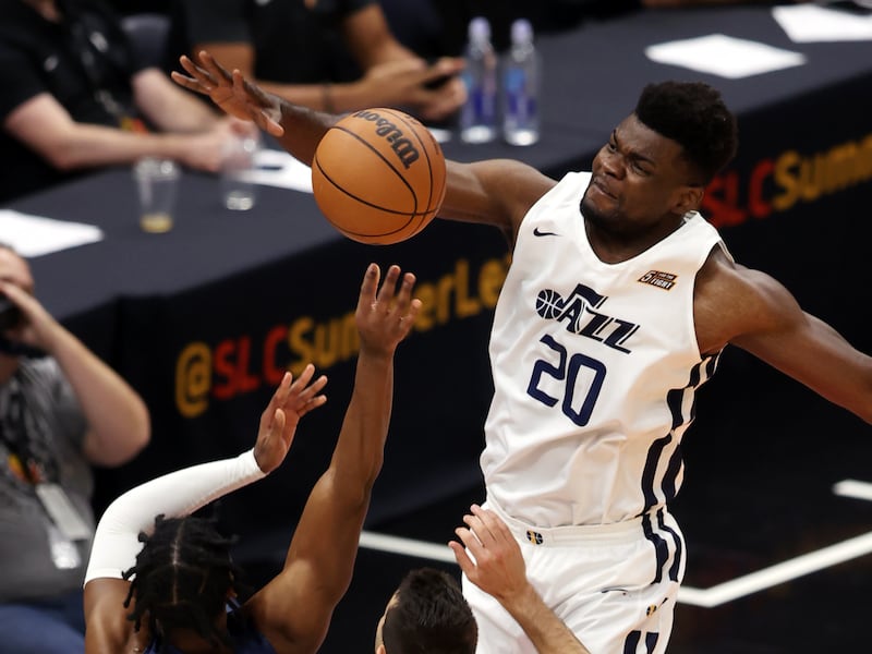 Utah Jazz White team center Udoka Azubuike (20) blocks Utah Jazz Blue team guard Malik Newman.