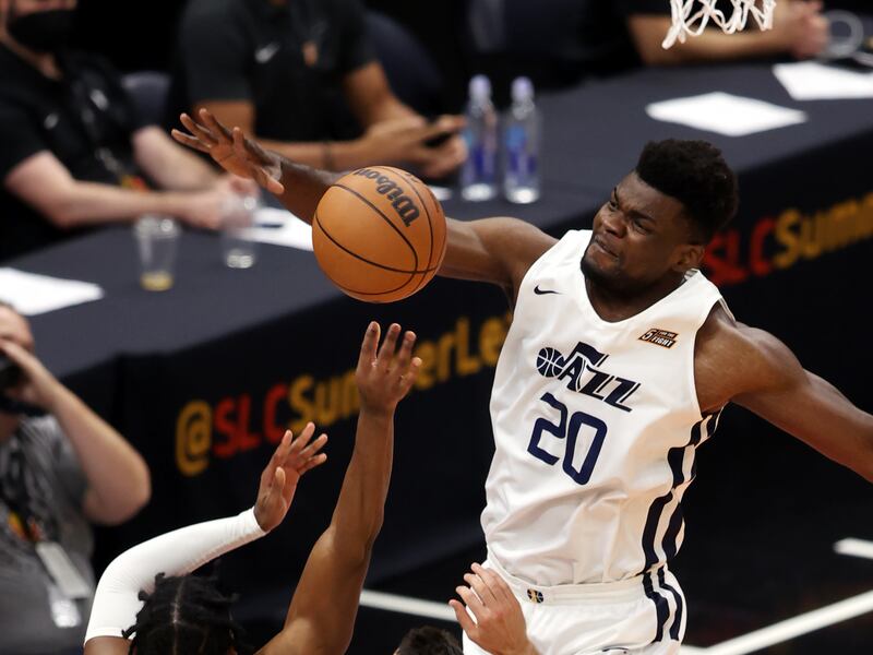 Utah Jazz White team center Udoka Azubuike (20) blocks Utah Jazz Blue team guard Malik Newman.