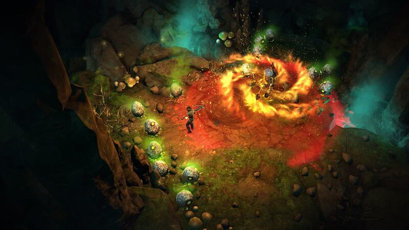 Demon hunter Victor Vran attacks a group of demons with supernatural powers in "Victor Vran."