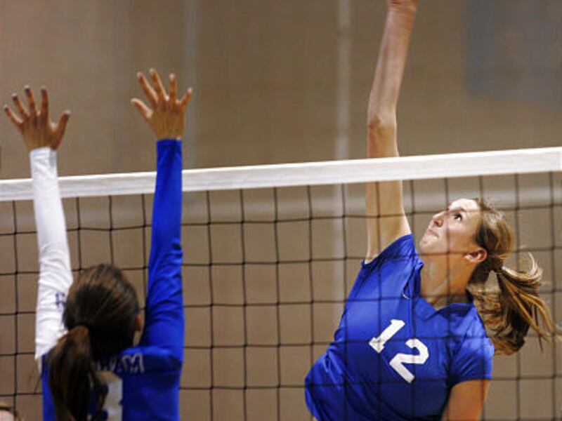 Pleasant Grove's Jennifer Hamson (12) is one of the top high school athletes in the state. At 6-foot-6, Hamson chose volleyball over gymnastics.