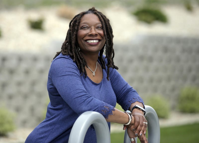 Darlene McDonald poses for a photograph Thursday, April 27, 2017, in Lehi, Utah. McDonald is a Salt Lake City-area woman running as a Democrat to unseat Utah Republican Rep. Mia Love next year.