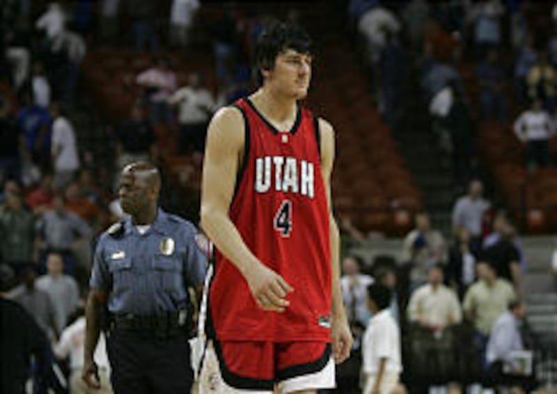 U. center Andrew Bogut walks off the floor on Friday after what will probably be his final college game.