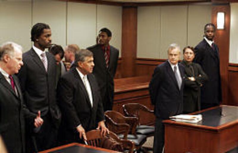 Indiana players Stephen Jackson, second from left, Ron Artest, center, and Jermaine O'Neal appear in court.