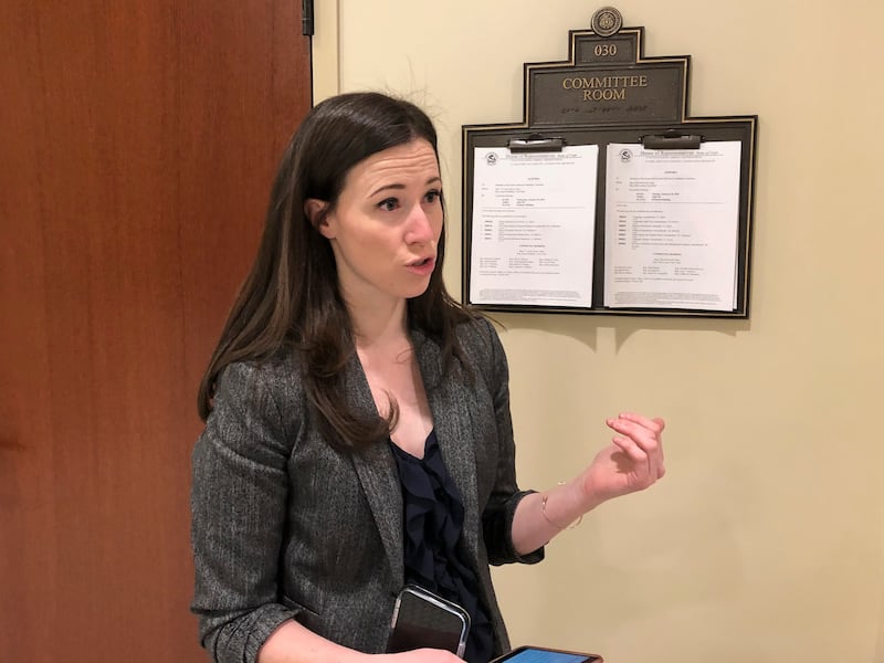 Utah Democratic Rep. Stephanie Pitcher talks to a colleague outside of a committee room at the state legislature in Salt Lake on Tuesday, Jan. 29, 2019. Pitcher is one of two lawmakers sponsoring a measure that would allow political candidates to use camp