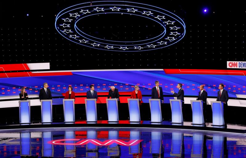 From left, Marianne Williamson, Rep. Tim Ryan, D-Ohio, Sen. Amy Klobuchar, D-Minn., South Bend Mayor Pete Buttigieg, Sen. Bernie Sanders, I-Vt., Sen. Elizabeth Warren, D-Mass., former Texas Rep. Beto O'Rourke, former Colorado Gov. John Hickenlooper, forme