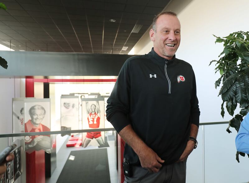 Utah basketball coach Larry Krystkowiak talks with reporters during media day in Salt Lake City on Wednesday, Sept. 26, 2018. When not coaching the Utes, Krystkowiak likes watching sons Ben and Luc compete on the hardwoods for the Brighton Bengals.
