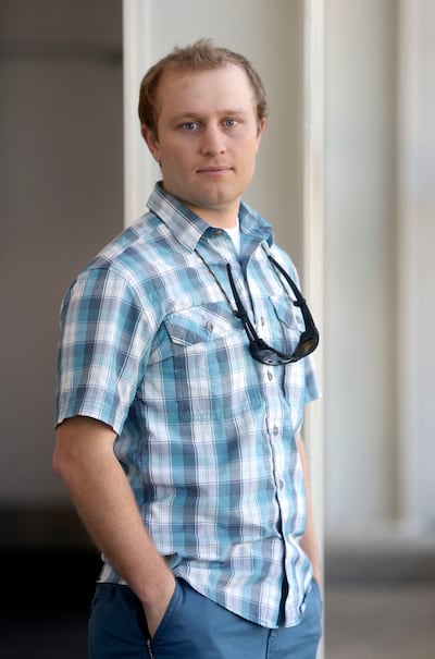 Nate Larsen, a graduate from Utah State University's new outdoor product design and development program, poses for a photo after graduation at the Dee Glen Smith Spectrum in Logan on Thursday, May 2, 2019.