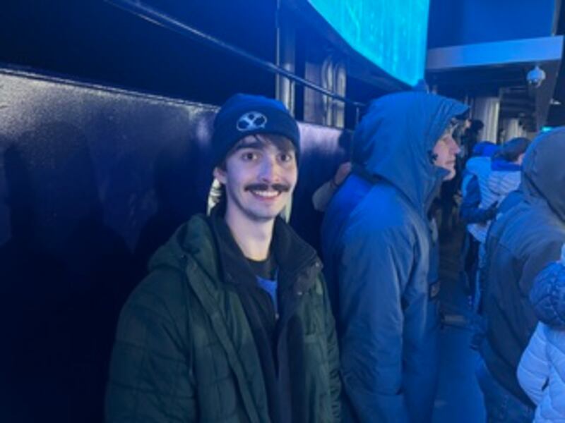 BYU student Quentin Carney smiles during the Cougars' game against Kansas at LaVell Edwards Stadium Saturday, Nov. 16, 2024.