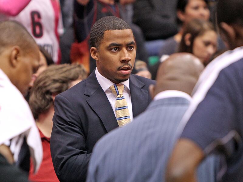 Former University of Utah basketball player Johnnie Bryant, now a Utah Jazz assistant, as the Utah Jazz and the Miami Heat play NBA basketball Monday, Jan. 14, 2013, in Salt Lake City.