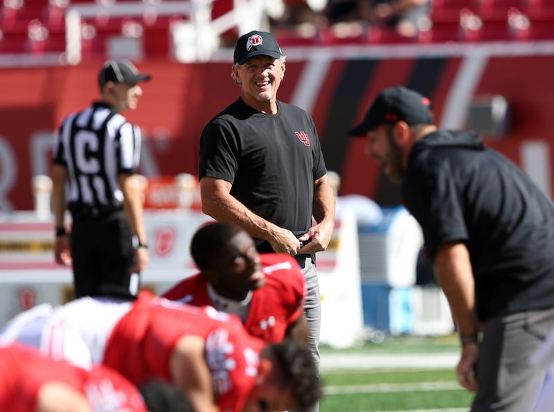 Utah Utes head coach Kyle Whittingham watches his players stretch as Utah and Oregon State prepare to play in Salt Lake City.