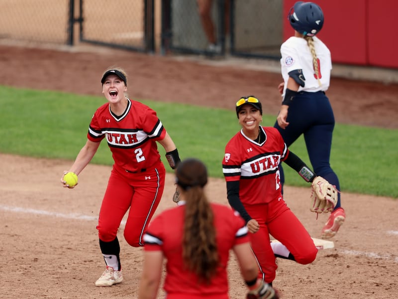 Utah players celebrate as they defeat Ole Miss in NCAA softball regional championship at Utah in Salt Lake City on Sunday.