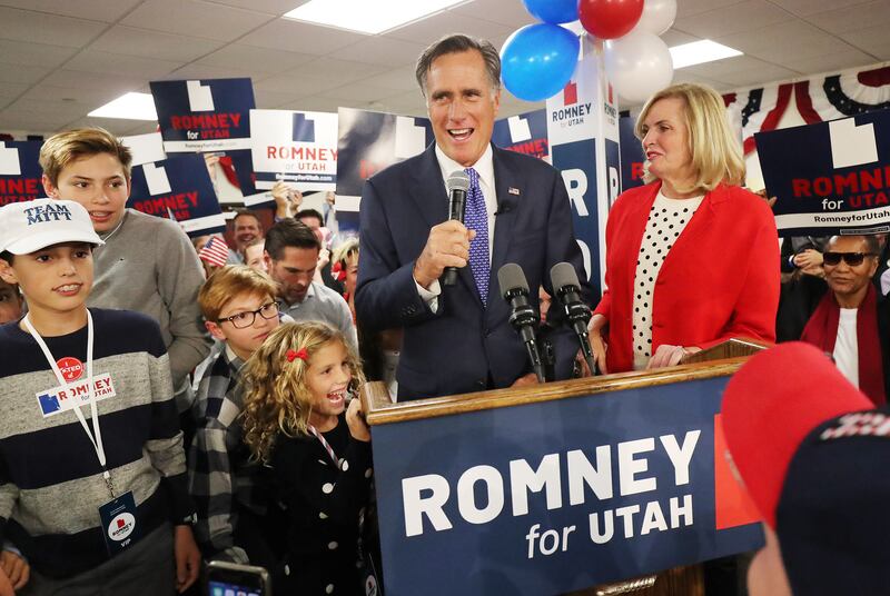 Mitt Romney is surrounded by family after winning his U.S. Senate race in 2018.