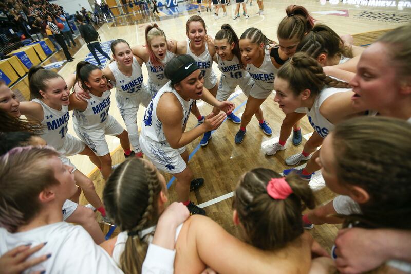 The Bingham Miners circle and cheer before playing the Copper Hills Grizzlies during the 6A girls basketball championship at the Lifetime Activities Center in Taylorsville on Saturday, Feb. 23, 2019.