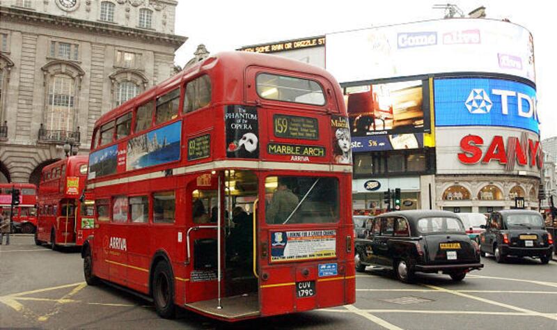 The old-style step on-off Routemaster red buses were mostly retired after the 1980s, but some continue to run through London's tourist routes between St. Paul's Cathedral and the Tower of London.