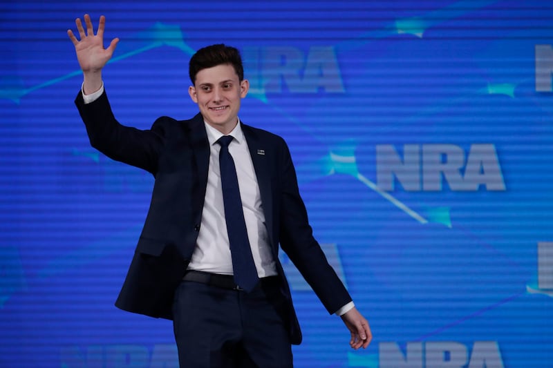 FILE - In this April 26, 2019 file photo, Kyle Kashuv, a survivor of the Marjory Stoneman Douglas High School shooting in Parkland, Fla., speaks at the National Rifle Association Institute for Legislative Action Leadership Forum in Indianapolis. On Monday